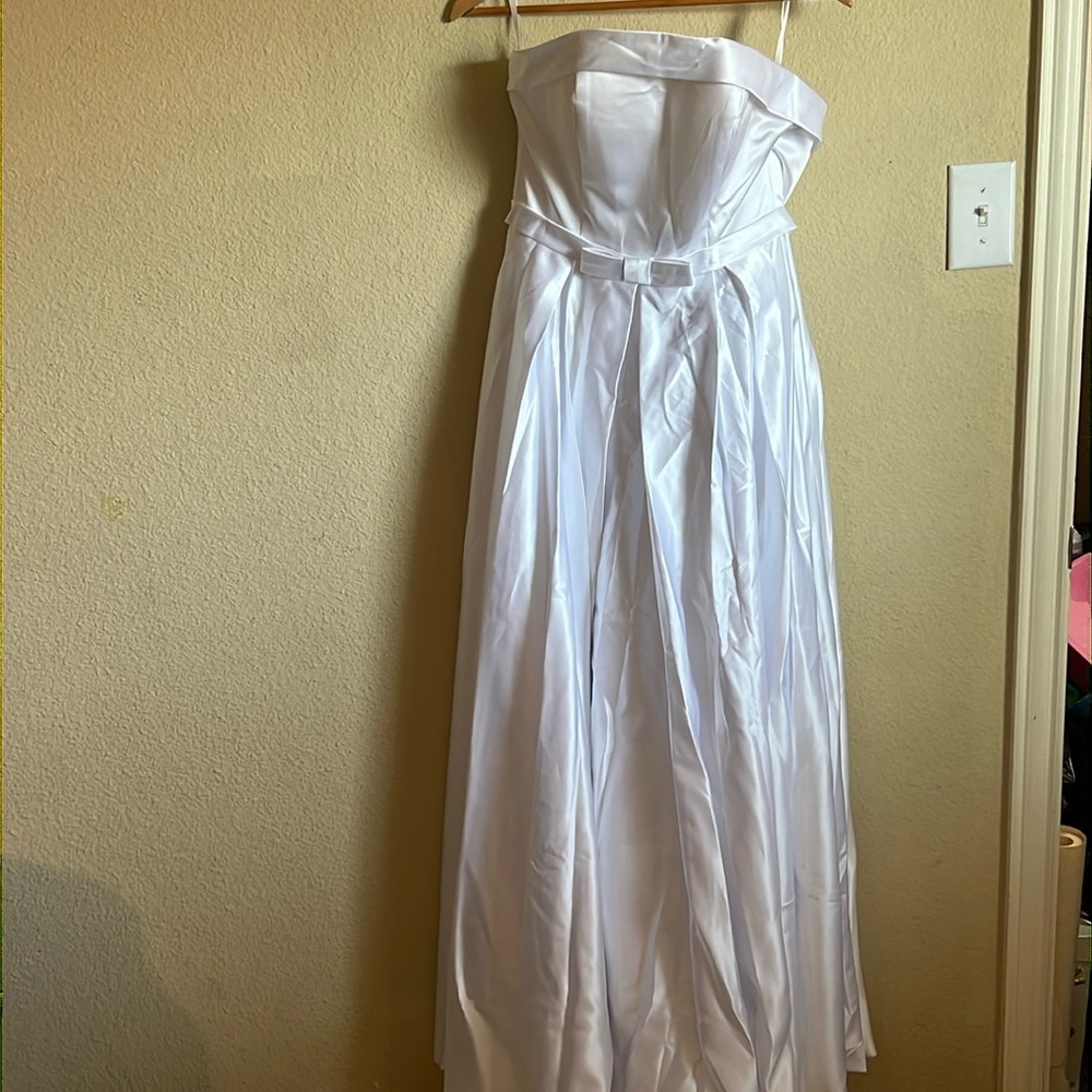 Simple white laced back wedding dress